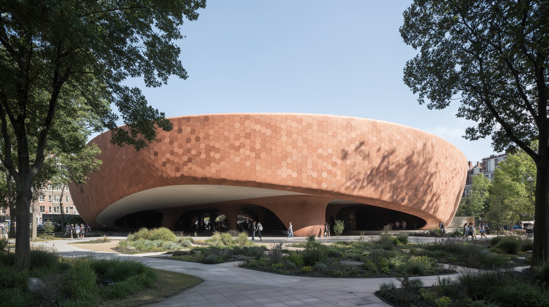 Astra Arena — terracotta drum raised on sculpted columns above a public forecourt
